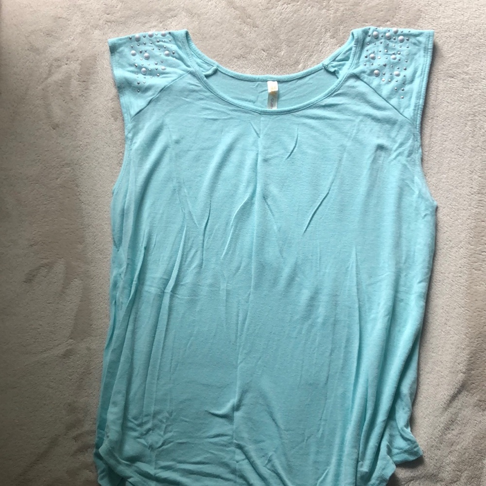 Top with studs on shoulder